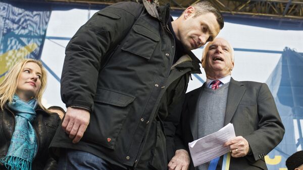 US Senator John McCain and leader of the UDAR opposition political party, Vitaly Klitschko, at the Dignity Day rally held by supporters of pro-EU integration in Kiev. - Sputnik International