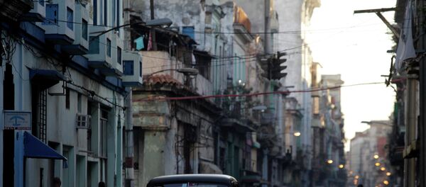 A car used as a taxi drives through the streets of Havana December 19, 2014. A car used as a taxi drives through the streets of Havana December 19, 2014. - Sputnik International