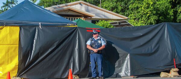 A policeman guards the scene of a stabbing attack at a home in Cairns, northern Queensland. - Sputnik International