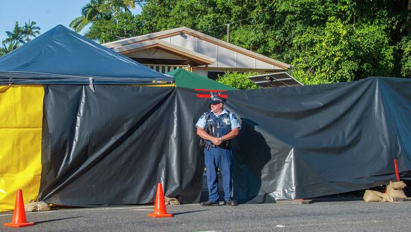 A policeman guards the scene of a stabbing attack at a home in Cairns, northern Queensland. - Sputnik International