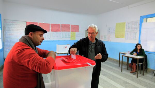 Tunisians are choosing the country's president on Sunday in the second round of the country's first-ever democratic election - Sputnik International