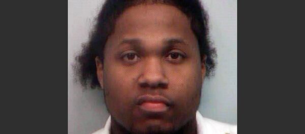 2010 file photo of Ismaaiyl Brinsley following his arrest by the Fulton County, Georgia Sheriff's Office. - Sputnik International