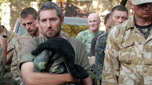 Captured Ukrainian soldiers taken out of the encirclement in Ilovaisk, near Donetsk - Sputnik International