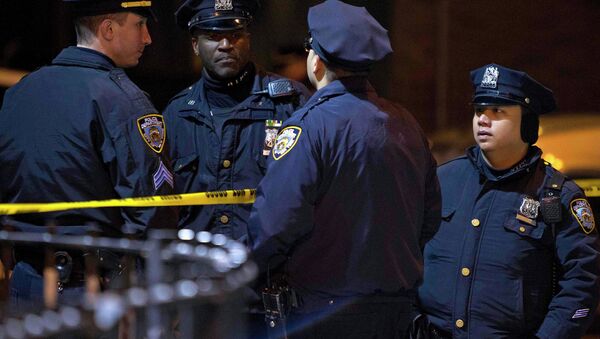 Police are pictured at the scene of a shooting where two New York Police officers were shot dead in the Brooklyn borough of New York, December 20, 2014 - Sputnik International