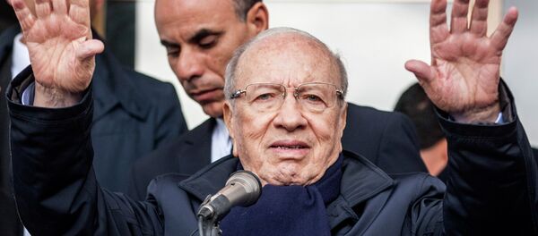 Beji Caid Essebsi, 88, a minister and parliamentary speaker under previous presidents, waves during a campaign speech in the region of Kef, north of Tunis, Tunisia. December 17, 2014. Beji Caid Essebsi, 88, a minister and parliamentary speaker under previous presidents, waves during a campaign speech in the region of Kef, north of Tunis, Tunisia. December 17, 2014. - Sputnik International