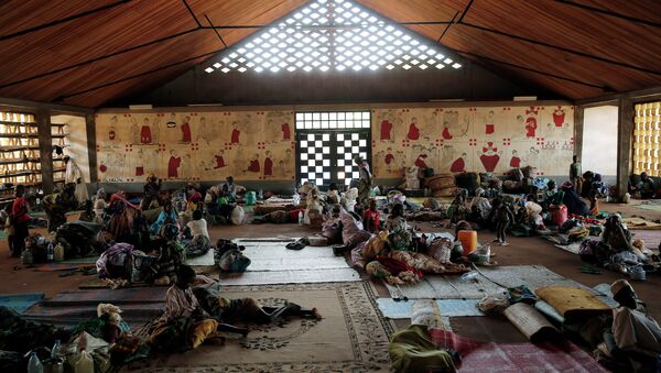 In this Monday, April 14, 2014 photo, Muslim refugees rest inside the Catholic church in Carnot, Central African Republic - Sputnik International