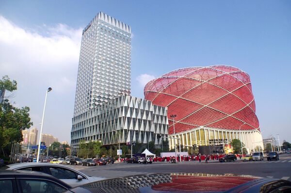 The Chinese lantern-shaped Han Show Theater, right, alongside the Wanda Reign Hotel in Wuhan, China The Chinese lantern-shaped Han Show Theater, right, alongside the Wanda Reign Hotel in Wuhan, China - Sputnik International