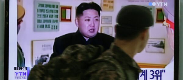 A South Korean army soldier watches a TV news program showing North Korean leader Kim Jong Un at the Seoul Railway Station in Seoul, South Korea, Monday, Dec. 22, 2014 - Sputnik International