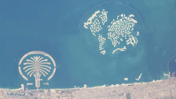 One of the islands in the 'Heart of Europe' section of Dubai's World Islands project has received a batch of real snow! This 2010 satellite photo shows the artificial archipelago from space; to the left is the so-called Palm Islands project - Sputnik International