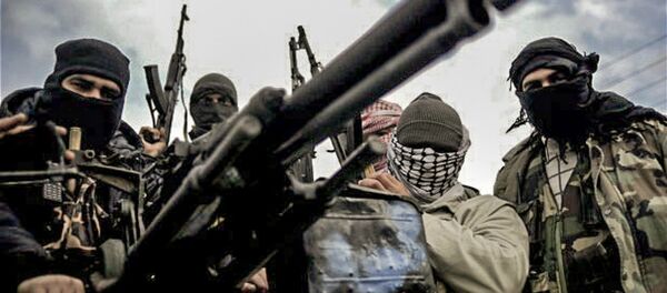 Syrian rebel army patrol an area near Homs - Sputnik International