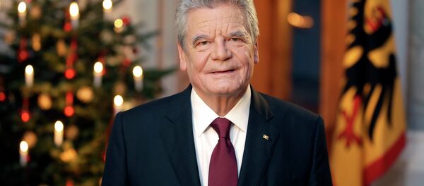 German President Joachim Gauck poses after the recording of the traditional Christmas message at Bellevue Palace in Berlin, December 22, 2014 - Sputnik International