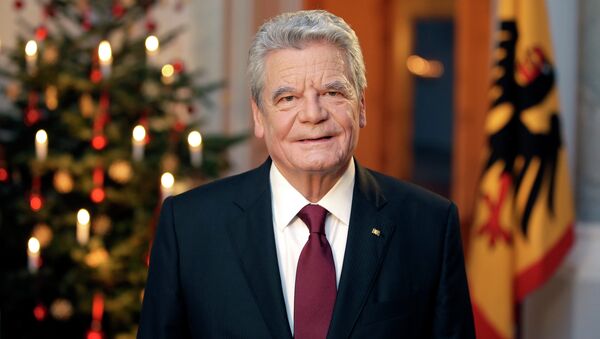German President Joachim Gauck poses after the recording of the traditional Christmas message at Bellevue Palace in Berlin, December 22, 2014 - Sputnik International