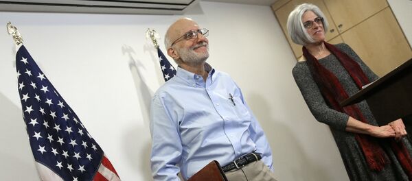 USAID subcontractor Alan Gross has been paid a $3.2 million settlement following his release from a Cuban prison. Pictured: Gross with his wife Judy at a press conferewnce in Washington, D.C. shortly after his release USAID subcontractor Alan Gross has been paid a $3.2 million settlement following his release from a Cuban prison. Pictured: Gross with his wife Judy at a press conferewnce in Washington, D.C. shortly after his release - Sputnik International