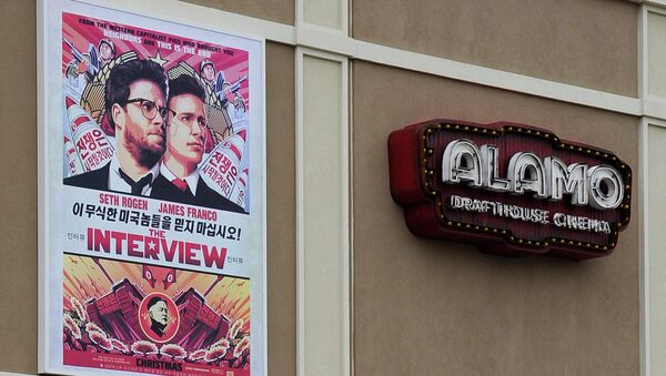 A large poster advertising the movie The Interview hangs on the back wall of the Alamo Drafthouse Cinema Tuesday in Houston - Sputnik International