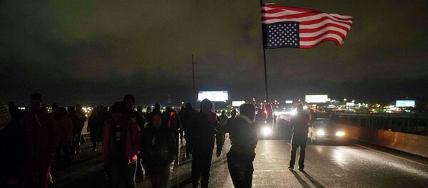 - More than 120 people have marched in silence through downtown St.Louis, Missouri, protesting against police brutality, St. Louis Post-Dispatch reported. - Sputnik International