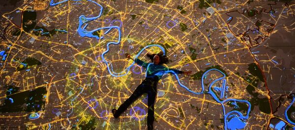 A visitor at the opening of the Interactive Moscow Map hall A visitor at the opening of the Interactive Moscow Map hall - Sputnik International