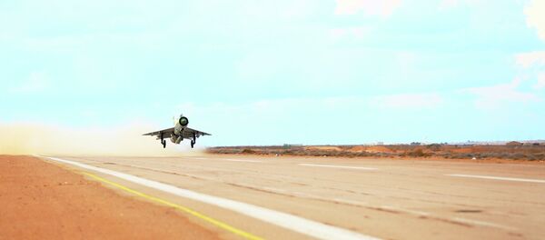 A MiG-21 fighter jet belonging to forces loyal to former general Khalifa Haftar takes off from a base on the outskirts of Al Sidra oil port, in Ras Lanuf A MiG-21 fighter jet belonging to forces loyal to former general Khalifa Haftar takes off from a base on the outskirts of Al Sidra oil port, in Ras Lanuf - Sputnik International