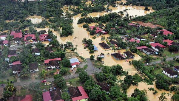 Over 100,000 people have been evacuated due to Malaysia’s worst flooding in decades - Sputnik International