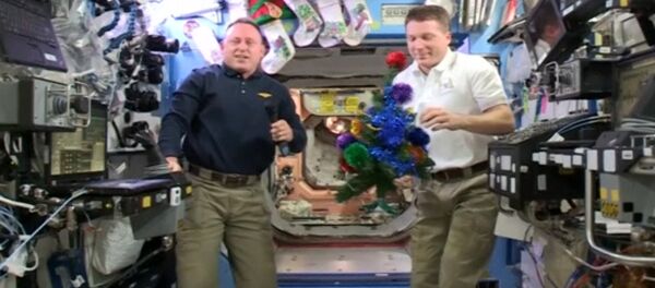 NASA Astronauts From ISS Wish World Merry Christmas and Happy New Year - Sputnik International