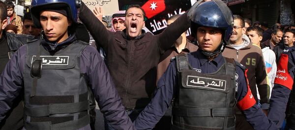 People shout slogans to call for the freedom of Jordanian pilot Mu'ath al-Kaseasbeh, held by the Islamic State group in the Syrian city of Raqqa People shout slogans to call for the freedom of Jordanian pilot Mu'ath al-Kaseasbeh, held by the Islamic State group in the Syrian city of Raqqa - Sputnik International