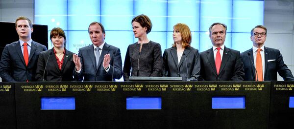 Prime Minister Stefan Lofven gestures next to leaders of Swedish political parties during a news conference at the Swedish Parliament in Stockholm Prime Minister Stefan Lofven gestures next to leaders of Swedish political parties during a news conference at the Swedish Parliament in Stockholm - Sputnik International