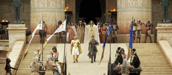 Joel Edgerton, center left, as Ramses, and Christian Bale, center right, as Moses, in a scene from the film, Exodus: Gods and Kings. Joel Edgerton, center left, as Ramses, and Christian Bale, center right, as Moses, in a scene from the film, Exodus: Gods and Kings. - Sputnik International