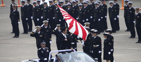 Japanese Prime Minister Shinzo Abe reviews members of the Japan Self-Defense Force during the annual Self-Defense Forces Commencement of Air Review at Hyakuri Air Base, north of Tokyo - Sputnik International
