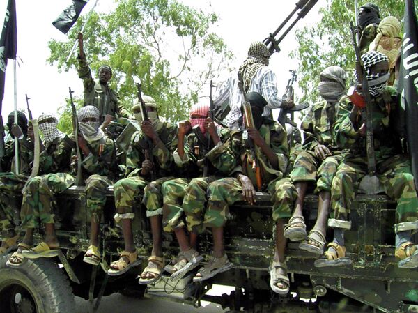 Al-Shabaab fighters display weapons as they conduct military exercises in northern Mogadishu, Somalia Al-Shabaab fighters display weapons as they conduct military exercises in northern Mogadishu, Somalia - Sputnik International