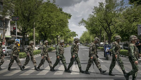 Thai soldiers patrol near government buildings on May 23, 2014 in Bangkok, Thailand - Sputnik International