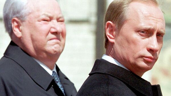 Former Russian president Boris Yeltsin (L) stands close to Russian President Vladimir Putin in Moscow in this May 7, 2000 file photo - Sputnik International