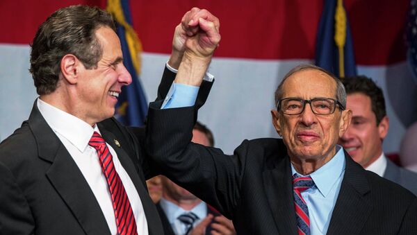 Democratic Governor Andrew Cuomo reacts with his father Mario (R) after being re-elected for the US midterm race in New York in this November 4, 2014 file photo. - Sputnik International