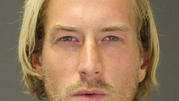 Thomas Gilbert Jr., after his arrest on Sept. 18, 2014 - Sputnik International