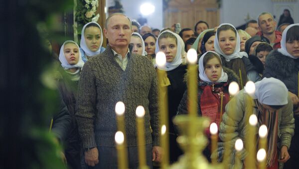 Russian President Putin attends Christmas service - Sputnik International