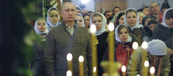 Russian President Putin attends Christmas service Russian President Putin attends Christmas service - Sputnik International