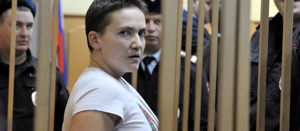 Ukrainian pilot Nadezhda Savchenko, accused of complicity in the murder of Russian journalists Ukrainian pilot Nadezhda Savchenko, accused of complicity in the murder of Russian journalists - Sputnik International