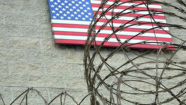 This August 7, 2013 file photo shows the US flag at the US Naval Base in Guantanamo Bay, Cuba - Sputnik International