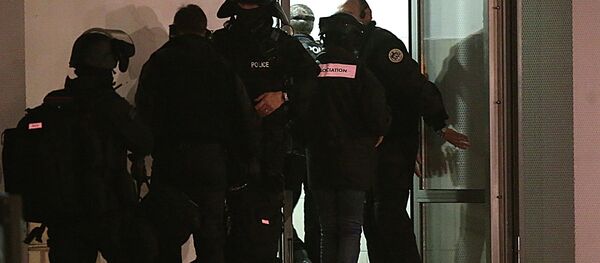 Police are seen during an operation in the Croix-Rouge suburb of Reims, northern France early January 8, 2015 - Sputnik International