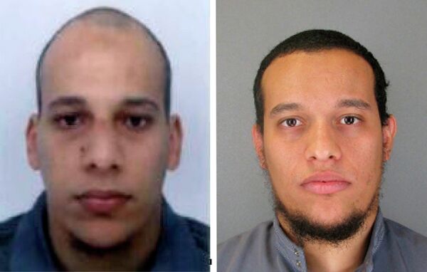 This photo provided by The Paris Police Prefecture Thursday, Jan.8, 2015 shows the suspects Cherif, left, and Said Kouachi in the newspaper attack along with a plea for witnesses This photo provided by The Paris Police Prefecture Thursday, Jan.8, 2015 shows the suspects Cherif, left, and Said Kouachi in the newspaper attack along with a plea for witnesses - Sputnik International