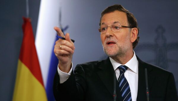 Spanish Prime Minister Mariano Rajoy holds a news conference at Moncloa palace in Madrid November 12, 2014 - Sputnik International
