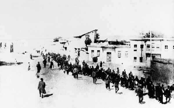 Armenian civilians escorted by Ottoman soldiers, being marched to a prison in southeastern Turkish city of Elazig, April 1915. Armenian civilians escorted by Ottoman soldiers, being marched to a prison in southeastern Turkish city of Elazig, April 1915. - Sputnik International