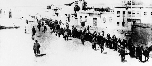 Armenian civilians escorted by Ottoman soldiers, being marched to a prison in southeastern Turkish city of Elazig, April 1915. - Sputnik International