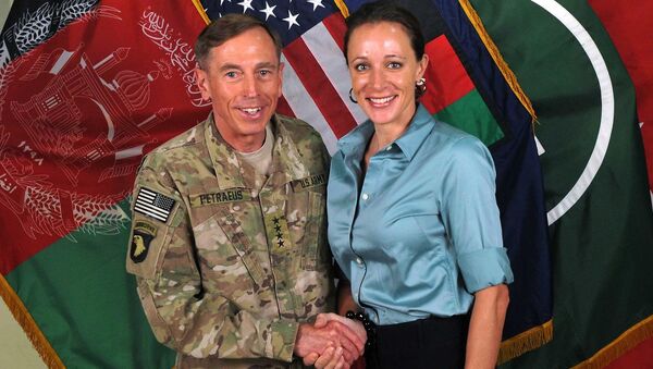 The former Commander of International Security Assistance Force and U.S. Forces-Afghanistan Gen. Davis Petraeus, left, shaking hands with Paula Broadwell, co-author of All In: The Education of General David Petraeus. - Sputnik International
