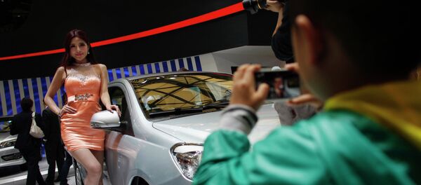 Female models in tight dresses and miniskirts may be banned from one of Asia's premier car exhibitions in Shanghai in 2015. Female models in tight dresses and miniskirts may be banned from one of Asia's premier car exhibitions in Shanghai in 2015. - Sputnik International