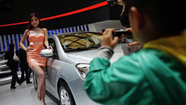 Female models in tight dresses and miniskirts may be banned from one of Asia's premier car exhibitions in Shanghai in 2015. - Sputnik International