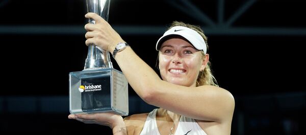 Maria Sharapova of Russia holds the Brisbane International tennis tournament women's singles trophy after defeating Ana Ivanovic of Serbia in Brisbane January 10, 2015. Maria Sharapova of Russia holds the Brisbane International tennis tournament women's singles trophy after defeating Ana Ivanovic of Serbia in Brisbane January 10, 2015. - Sputnik International