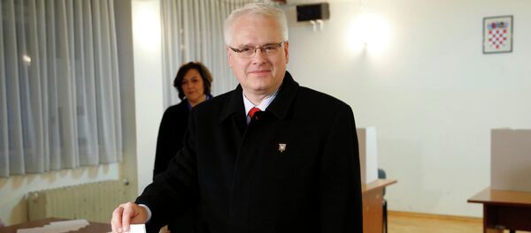 Croatian President and presidential candidate Ivo Josipovic casts his vote at a polling booth during the presidential run-off election in Zagreb Croatian President and presidential candidate Ivo Josipovic casts his vote at a polling booth during the presidential run-off election in Zagreb - Sputnik International