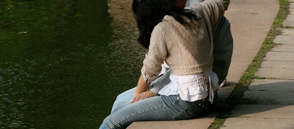 Lovers Sitting by the Water Lovers Sitting by the Water - Sputnik International