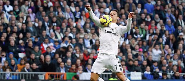 Real Madrid's Cristiano Ronaldo controls the ball during their Spanish first division soccer match against Espanyol at Santiago Bernabeu stadium in Madrid January 10, 2015. - Sputnik International