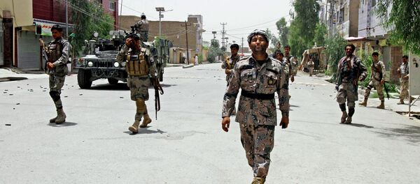 Afghan forces take positions during clashes with Taliban fighters in Kandahar, southern Kabul, Afghanistan Afghan forces take positions during clashes with Taliban fighters in Kandahar, southern Kabul, Afghanistan - Sputnik International