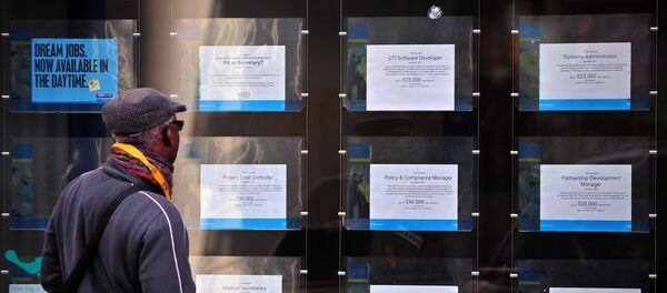 A man looks at job adverts in the window of a job recruitment centre in central London, on January 22, 2014 A man looks at job adverts in the window of a job recruitment centre in central London, on January 22, 2014 - Sputnik International